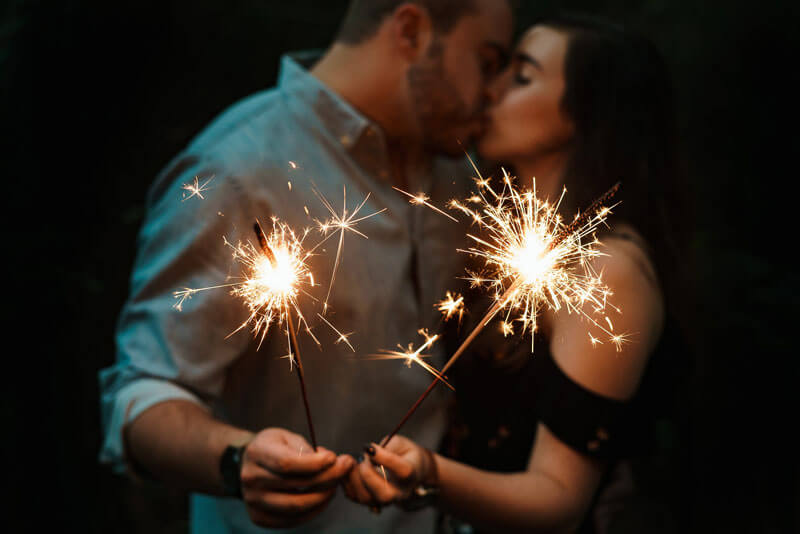 Couple kissing sparklers reignite romance