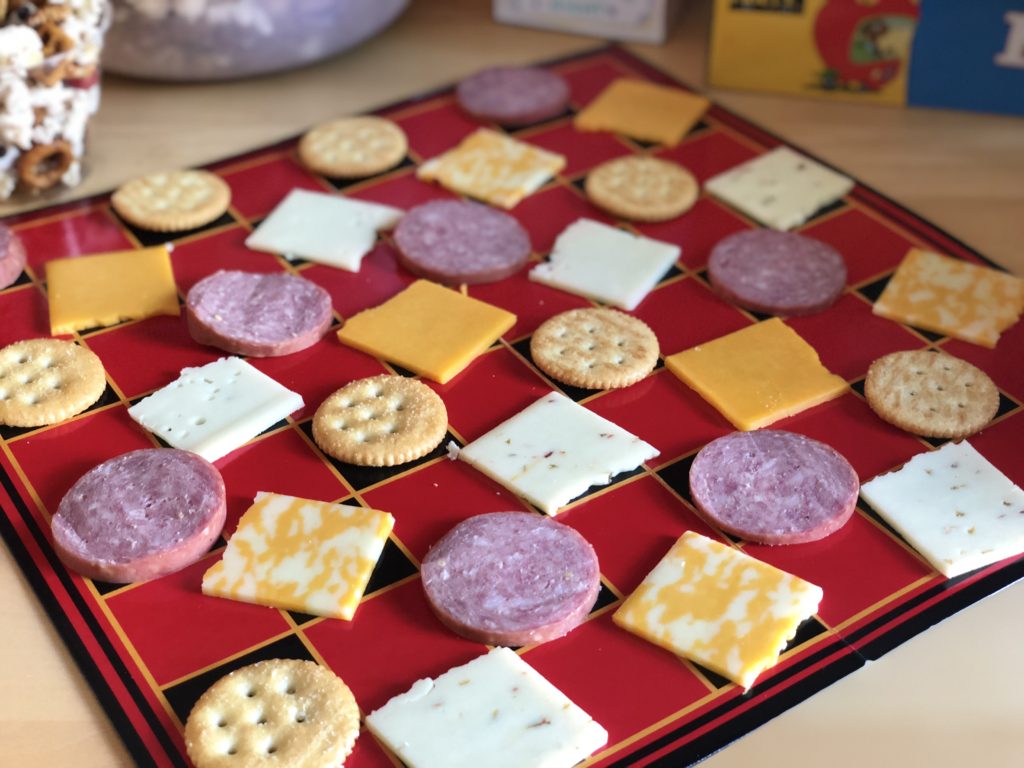 Family Game Night checkerboard cheese and crackers charcuterie plate