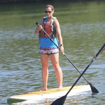Stand-Up Paddleboard Yoga with oar paddle life vest