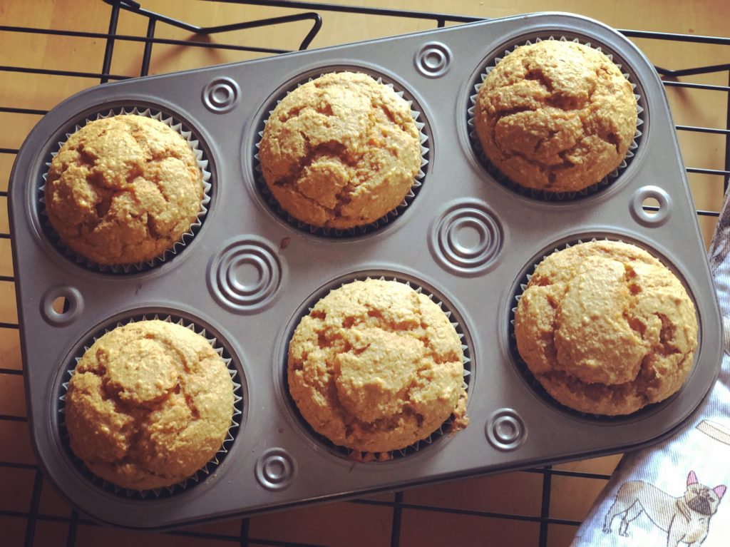 Fresh baked peanut butter banana cupcakes pupcakes muffins in tin unfrosted dog birthday treat