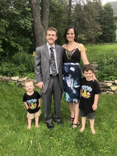 Family photo in backyard garden wedding outfits