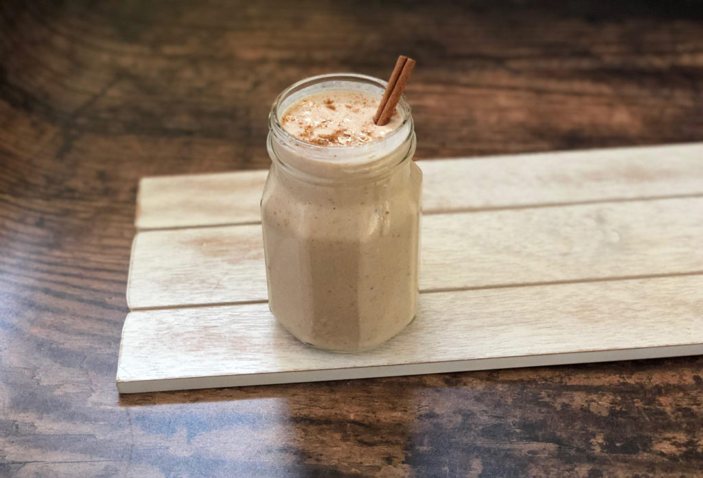 Healthy protein-packed Cinnamon Roll Oatmeal smoothie with no added sugar. Clean eating low-sugar breakfast on the go.