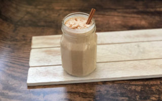 Healthy protein-packed Cinnamon Roll Oatmeal smoothie with no added sugar. Clean eating low-sugar breakfast on the go.