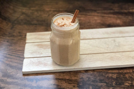 Healthy protein-packed Cinnamon Roll Oatmeal smoothie with no added sugar. Clean eating low-sugar breakfast on the go.