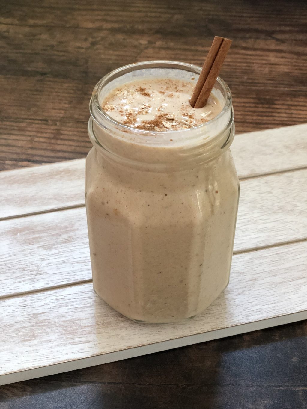 Healthy protein-packed Cinnamon Roll Oatmeal smoothie with no added sugar. Clean eating low-sugar breakfast on the go.