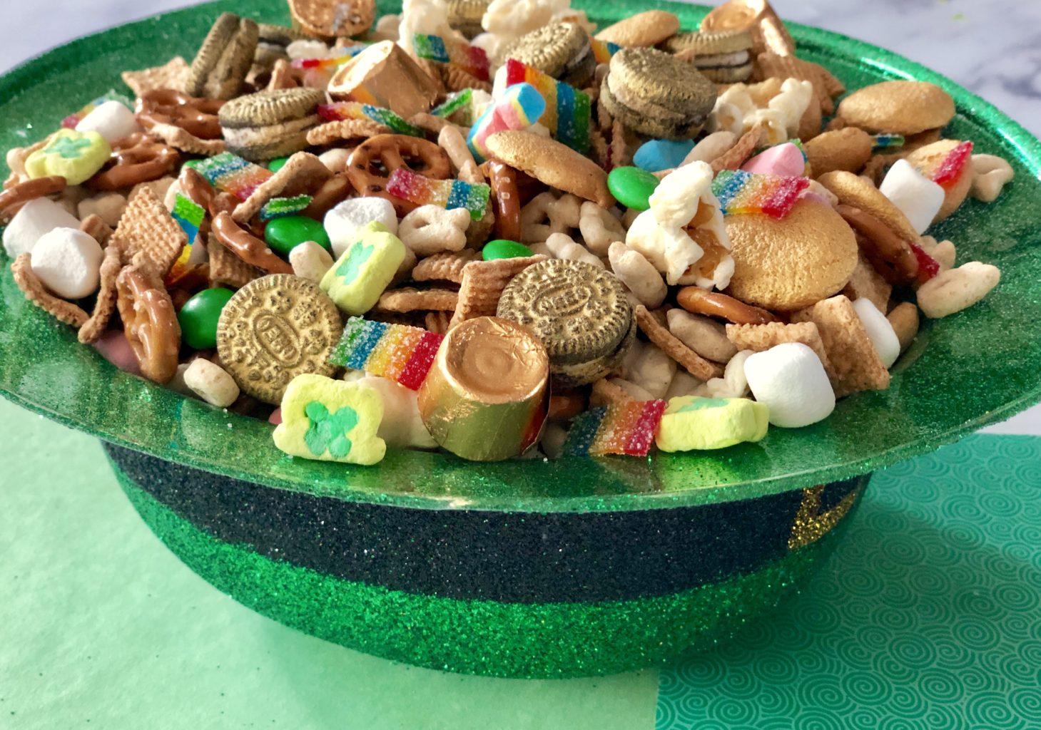 St. Patrick's Day Leprechaun Bait Trail Mix sweet and salty snack mix for kids and adults with cereal, candy, pretzels, more #stpatricksday #leprechaun #snacks #recipes #holidays