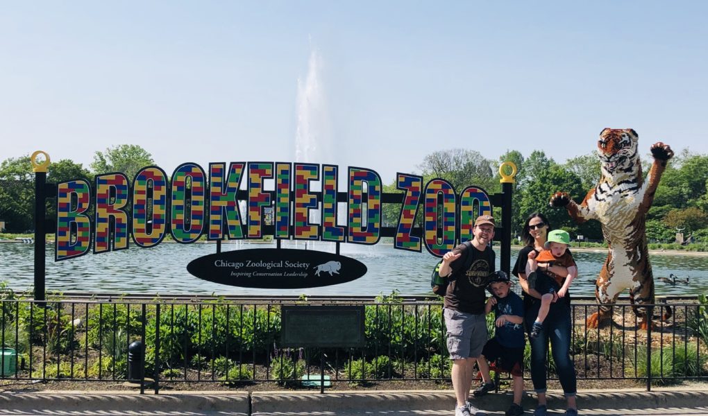 Family at Brookfield Zoo fountain LEGO sign LEGO tiger