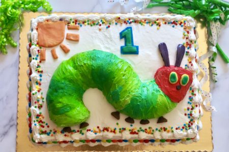 Very Hungry Caterpillar Bundt Cake step-by-step tutorial for semi-homemade cake success. No fondant or decorating tips required! Perfect for 1st birthday or baby shower #veryhungrycaterpillar #cakedecorating #partyinspiration #kidparty