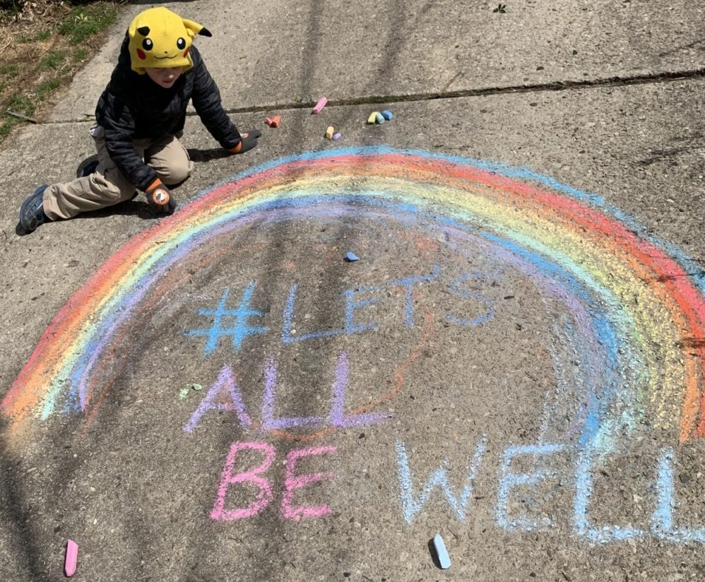 Easton outside coloring chalk on the driveway How to Work from Home with Kids Lessons from Coronavirus Age