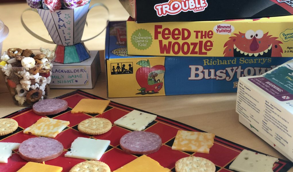 Family Game Night board games theme snacks trophy