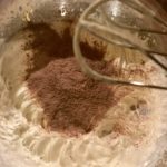 Hot Cocoa Whipped Cream Frosting: Two-ingredient, 10-minute recipe for cupcakes, cakes, cookies, coffee and more #frosting #cupcakes #dessert