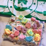 Lucky Charms Leprechaun Treats | A magically delicious twist on classic Rice Krispie Treats #stpatricksday #holidays #ricekrispietreats