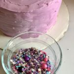 Amaretto Almond Buttercream Ombre Sprinkle Cake | Boozy grownup dessert with Disaronno Amaretto liquor in every bite | Recipe, tools, decorating tips and more #cakedecorating #sprinklecake #dessertrecipes #layercake