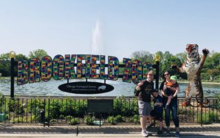 Family at Brookfield Zoo fountain LEGO sign LEGO tiger
